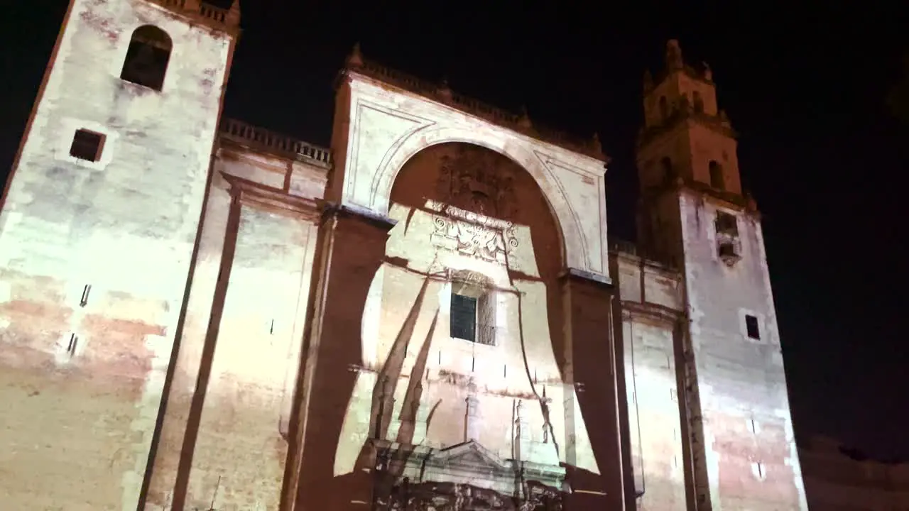 videomapping show showing a spanish galleon on the facade of the cathedral of merida yucatan