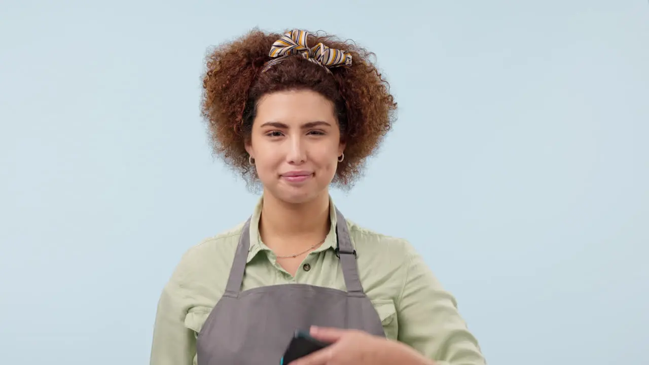 Woman with coffee POS and card machine