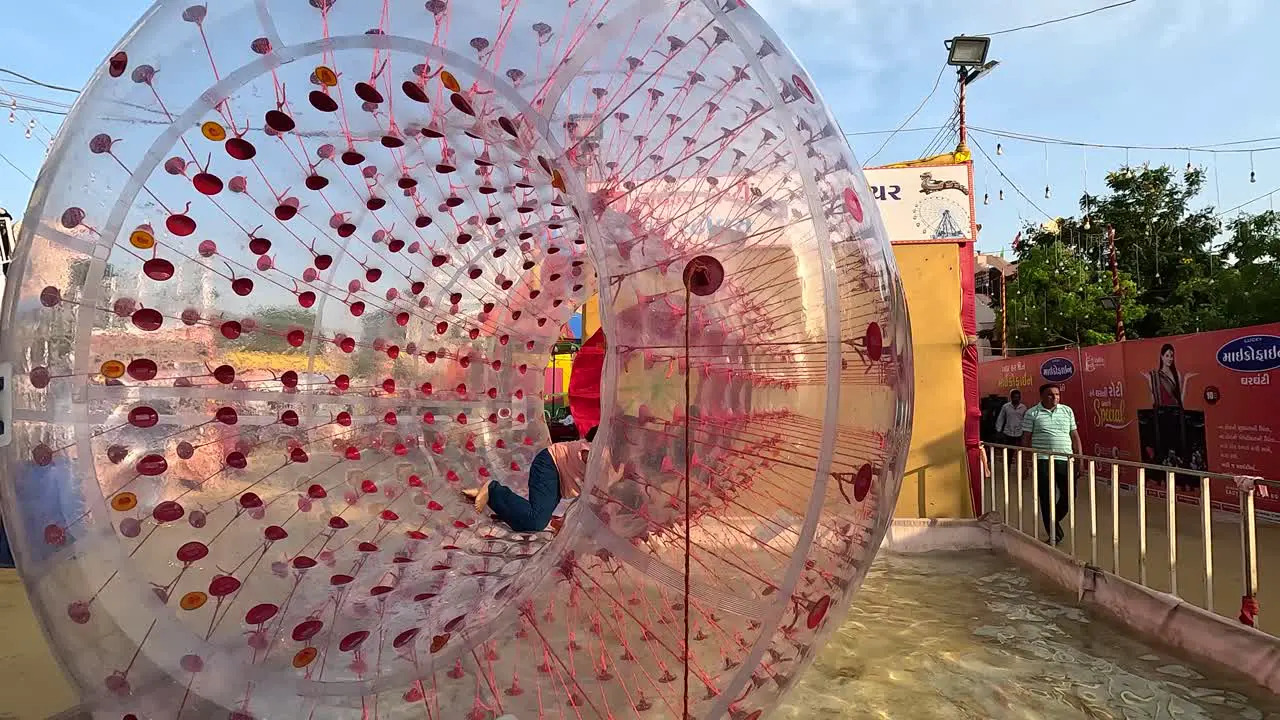 Two children are enjoying the water ride in the adventure park