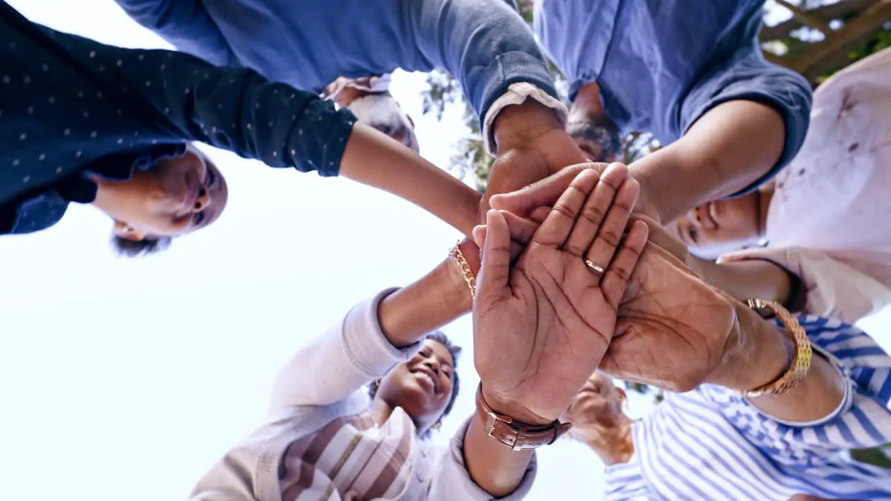 Stacked hands teamwork and business people