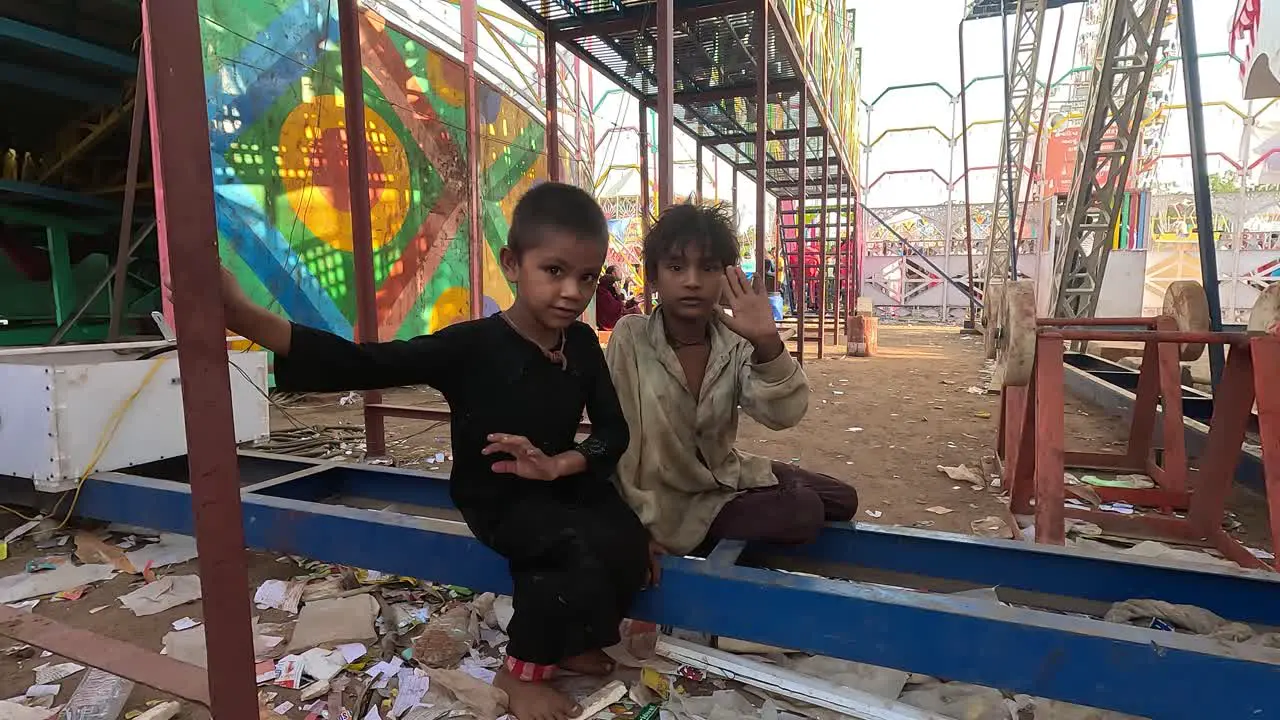 Two slum kits are very happy at the amusement park