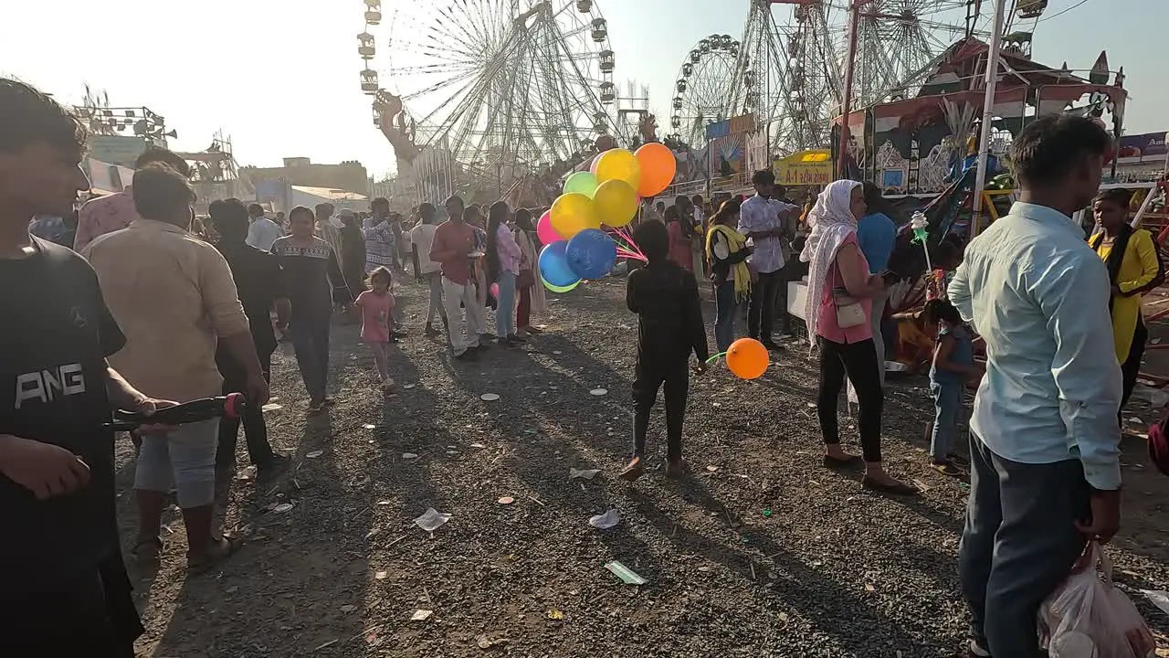 People are visiting amusement parks with their families on holidays