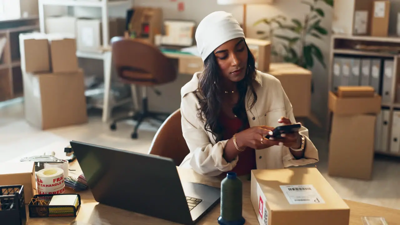 Phone laptop and a woman designer in her office