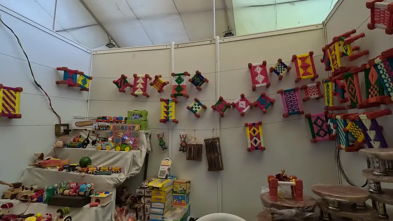 Small wooden children's tools and wooden toys being distributed in the shop