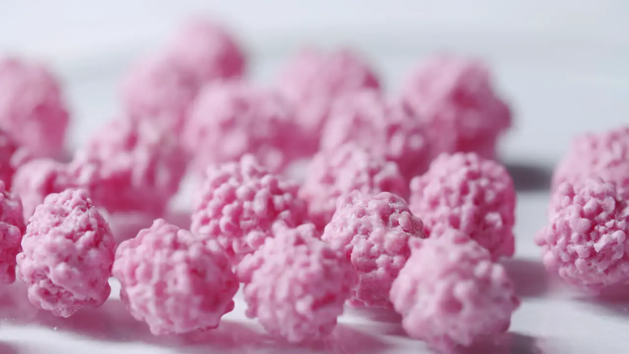 Close up shot of pink particles with shallow depth of field