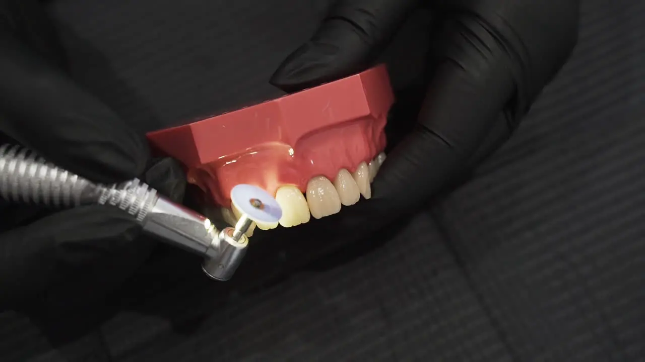 Denture polishing composite demonstration High angle close up