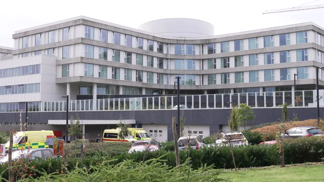 Entrance of the generic health care hospital Barrier going up for ambulance at the emergency gate