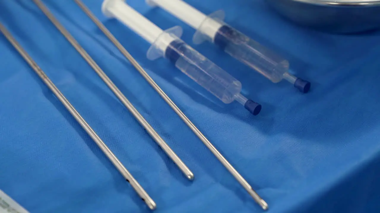 Surgical instruments for liposuction on the sterile table of an operating room