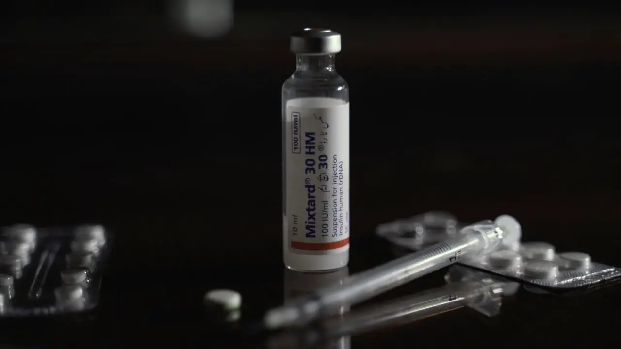 Pharmaceutical Medication Pills Vial And Syringe Closeup