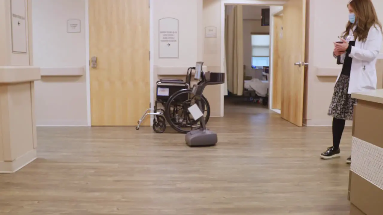 Telemedicine Robot Self-Navigating through Hospital Hallway with Nurse