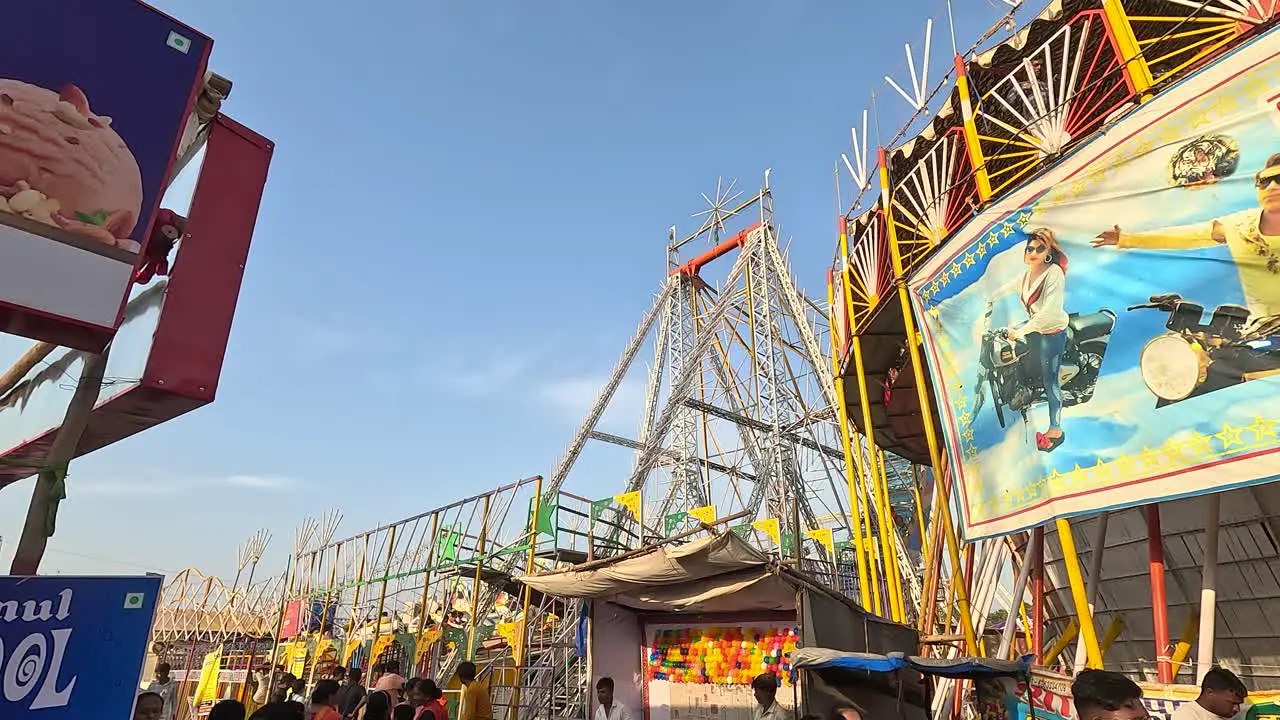 An amusement park dragon ride that is going up very fast from the bottom