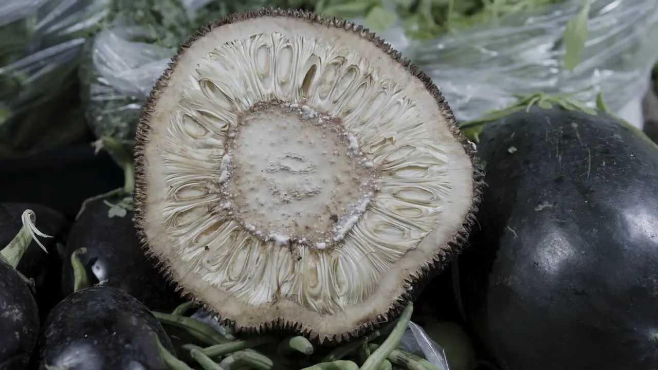 Jackfruit cut in half at vegetable store for sale at evening