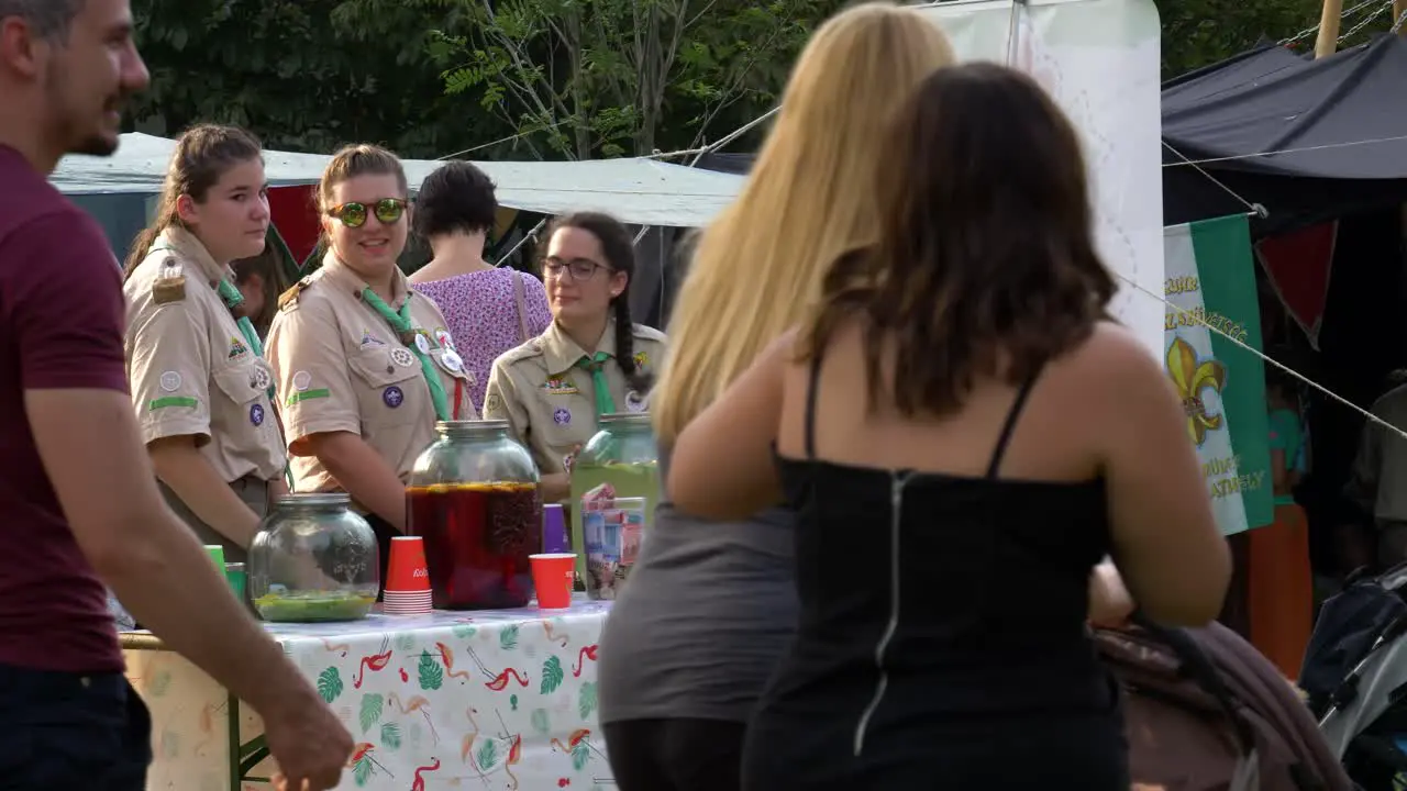 Savaria carnival Girls Scouts selling drinks