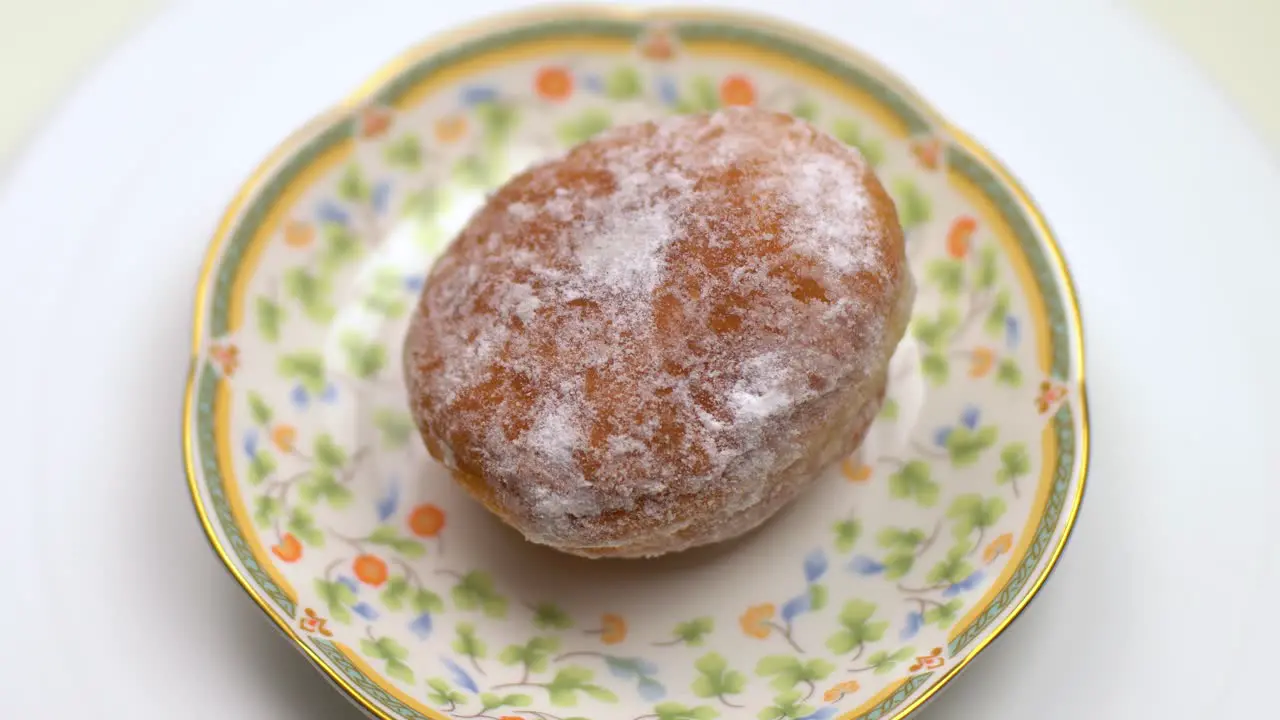 The donut rolls on the plate White background