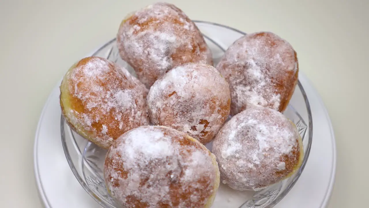 The donuts rolls on the plate White background