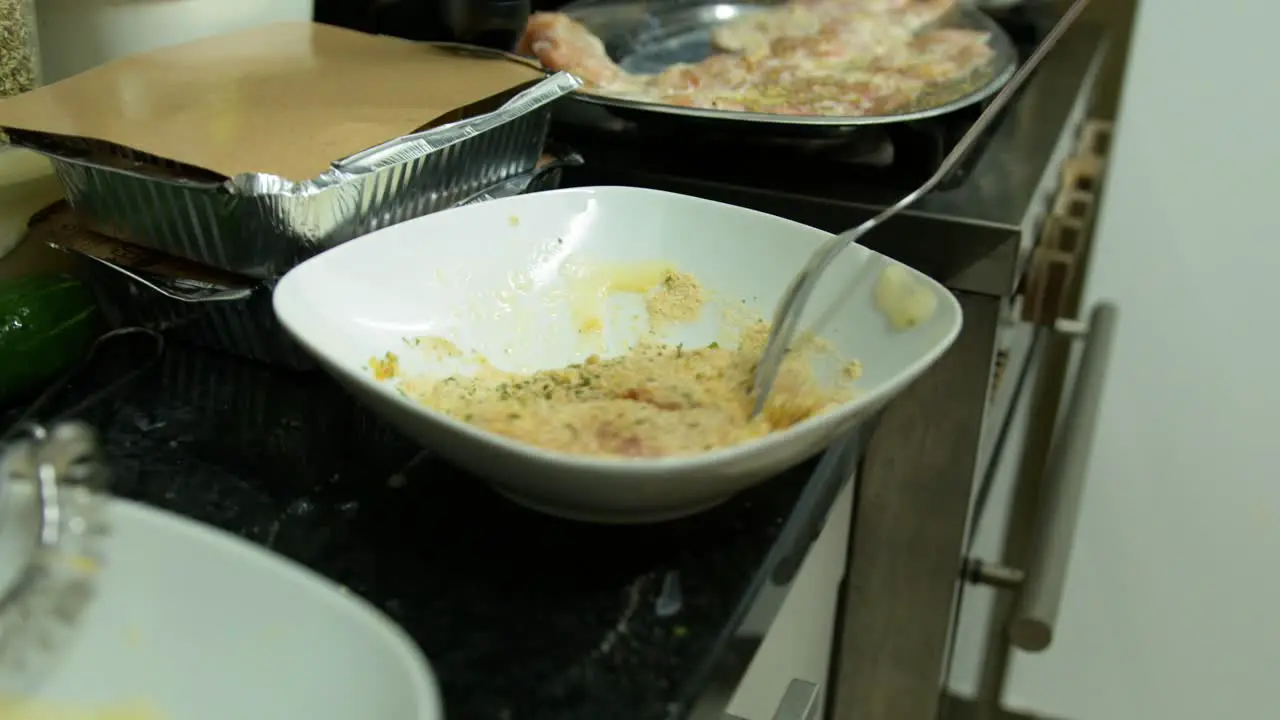 Dip chicken breast into bread crumbs flour delicious Crispy home cooking wide shot