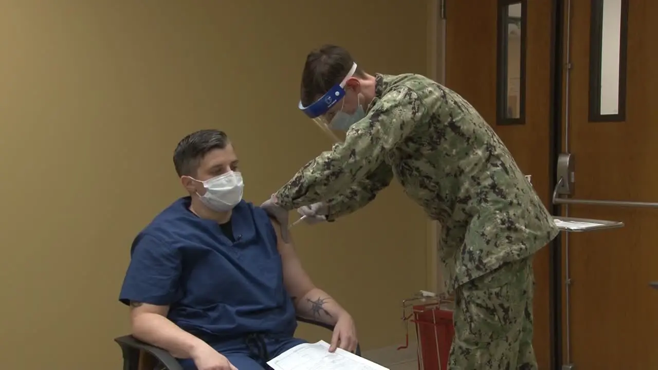 Naval Hospital Jacksonville Medical Personnel Begin Innoculating Sailors With Covid-19 Vaccinations