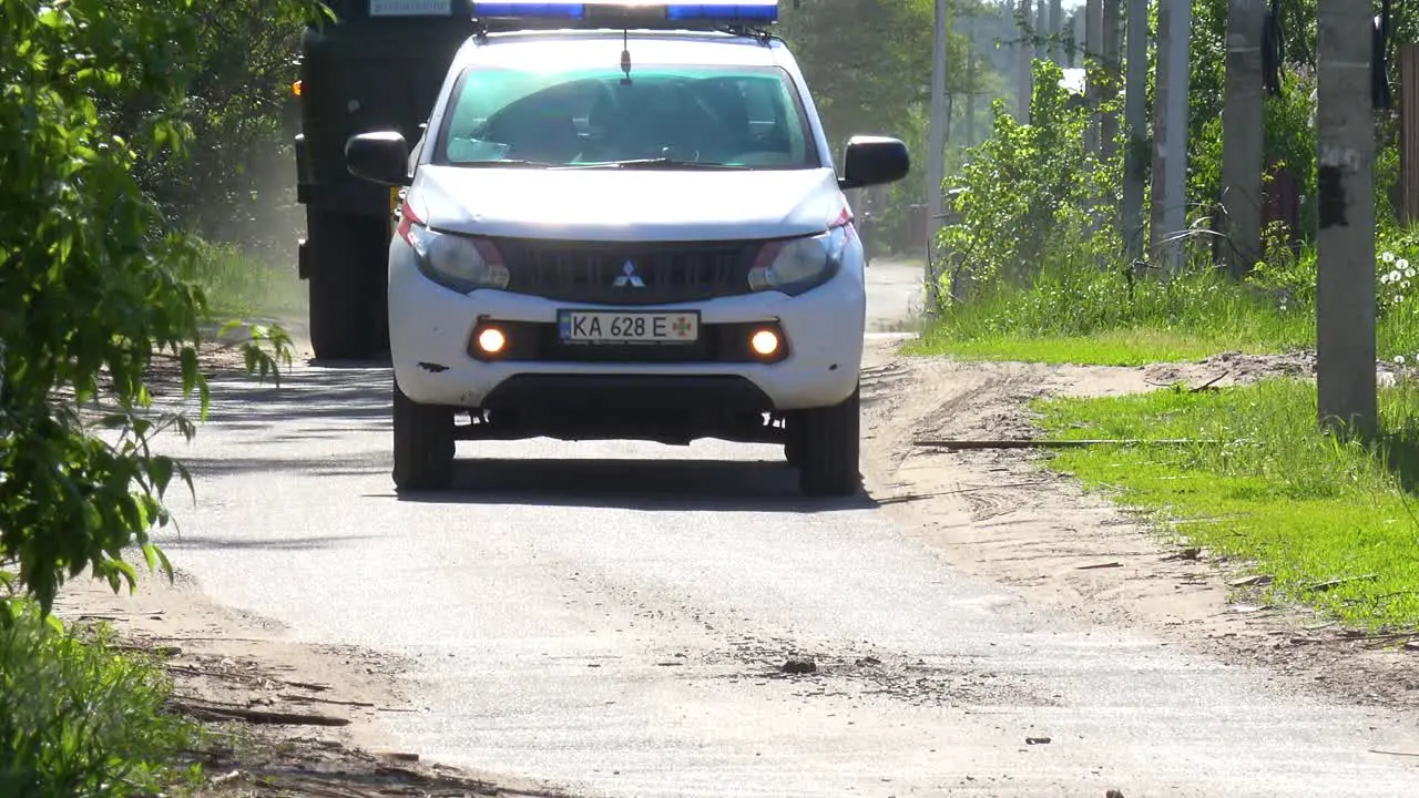 A Ukrainian Military Convoy Travels Along A Road During The War In Ukraine