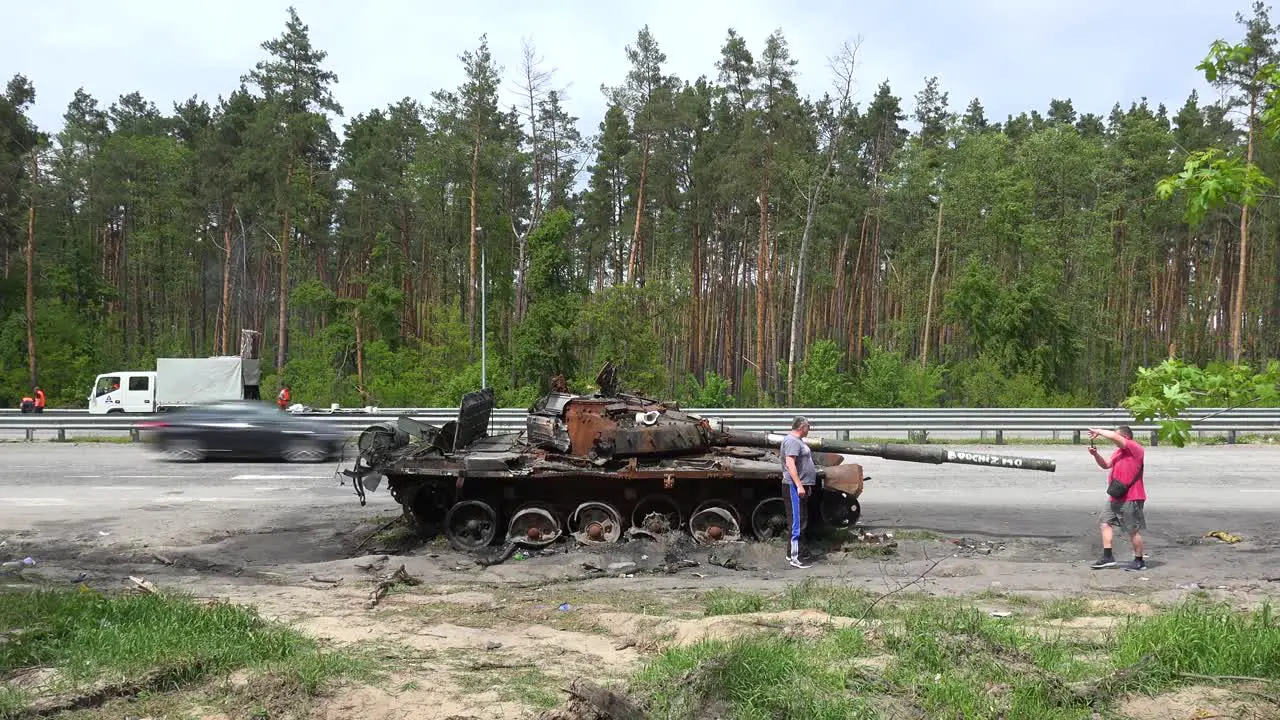 An Abandoned And Destroyed Russian Tank Along A Highway Into Kyiv Following The Russian Invasion