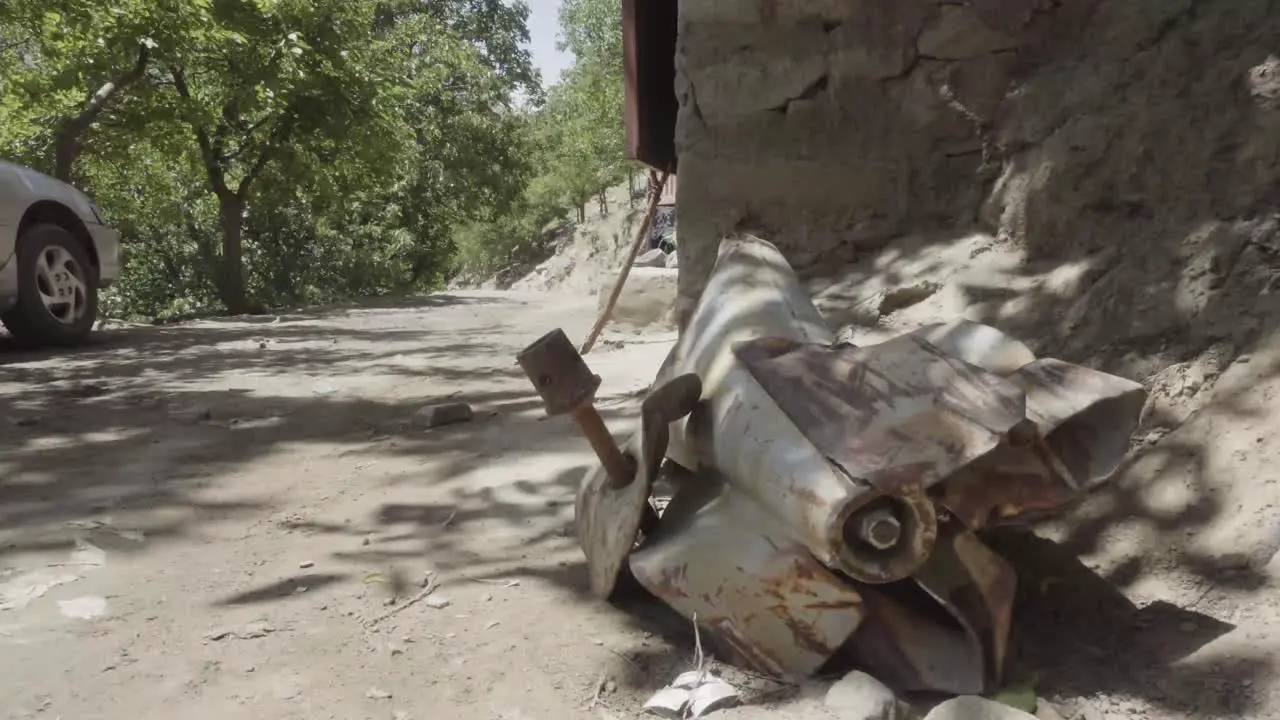 Unexploded powerful rocket with hand grenade on side Pashir valley Afghanistan