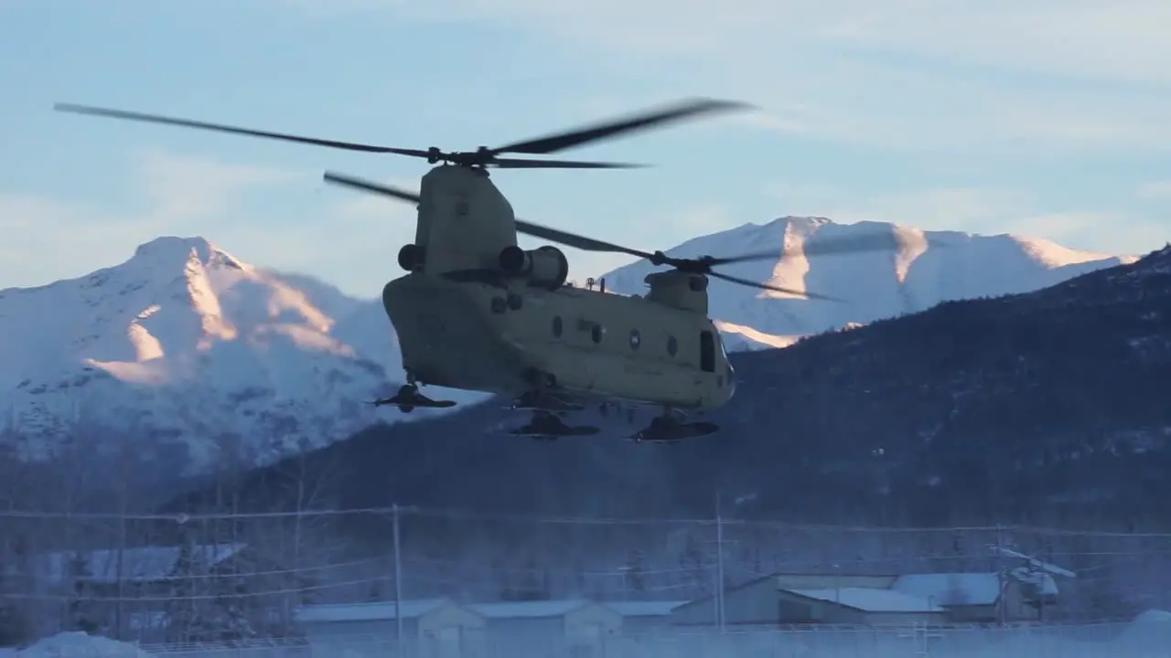 Alaska National Guard Pilots And Crew Fly Chinook Helicopter To Deliver Christmas Gifts To Children In Remote Villages