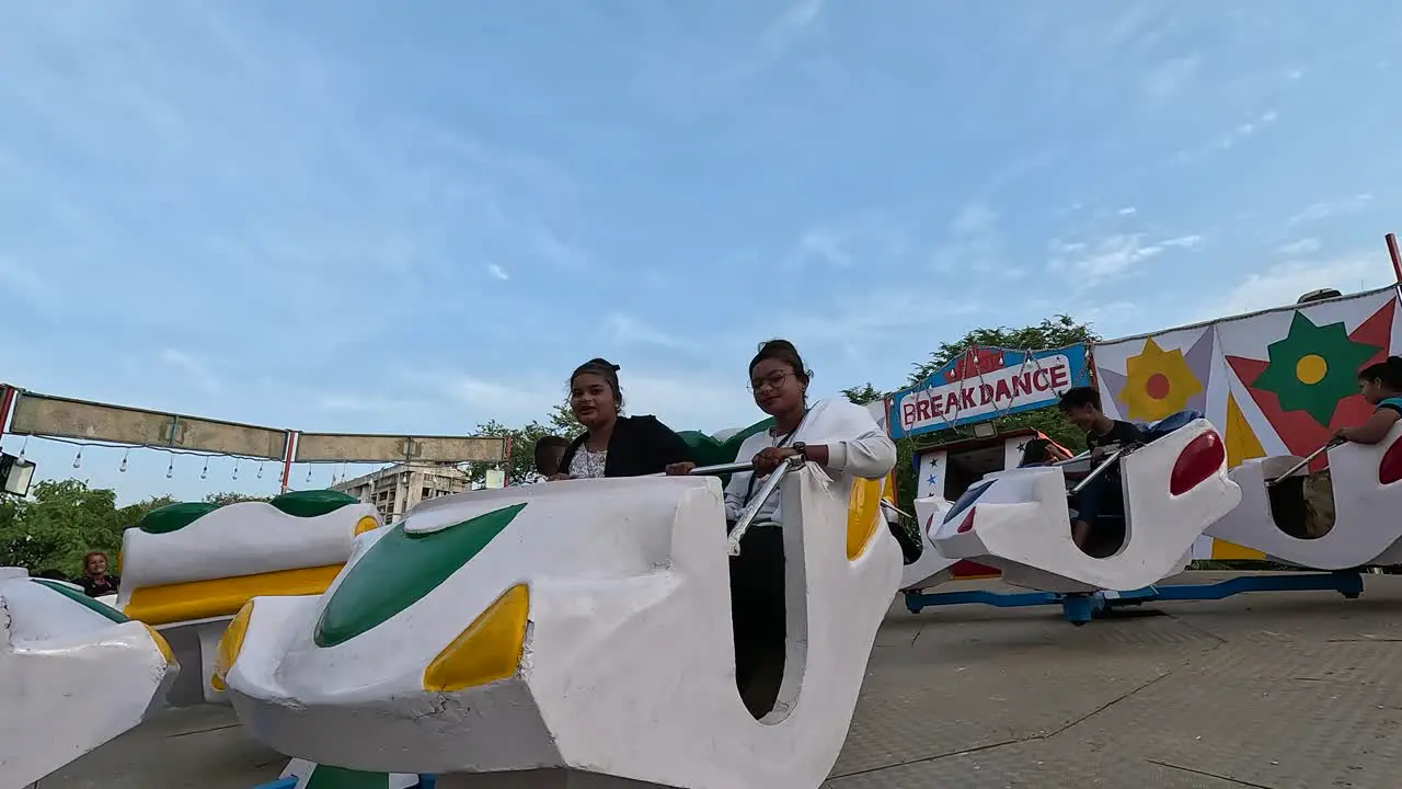 Break dance ride in which people are enjoying their vacation