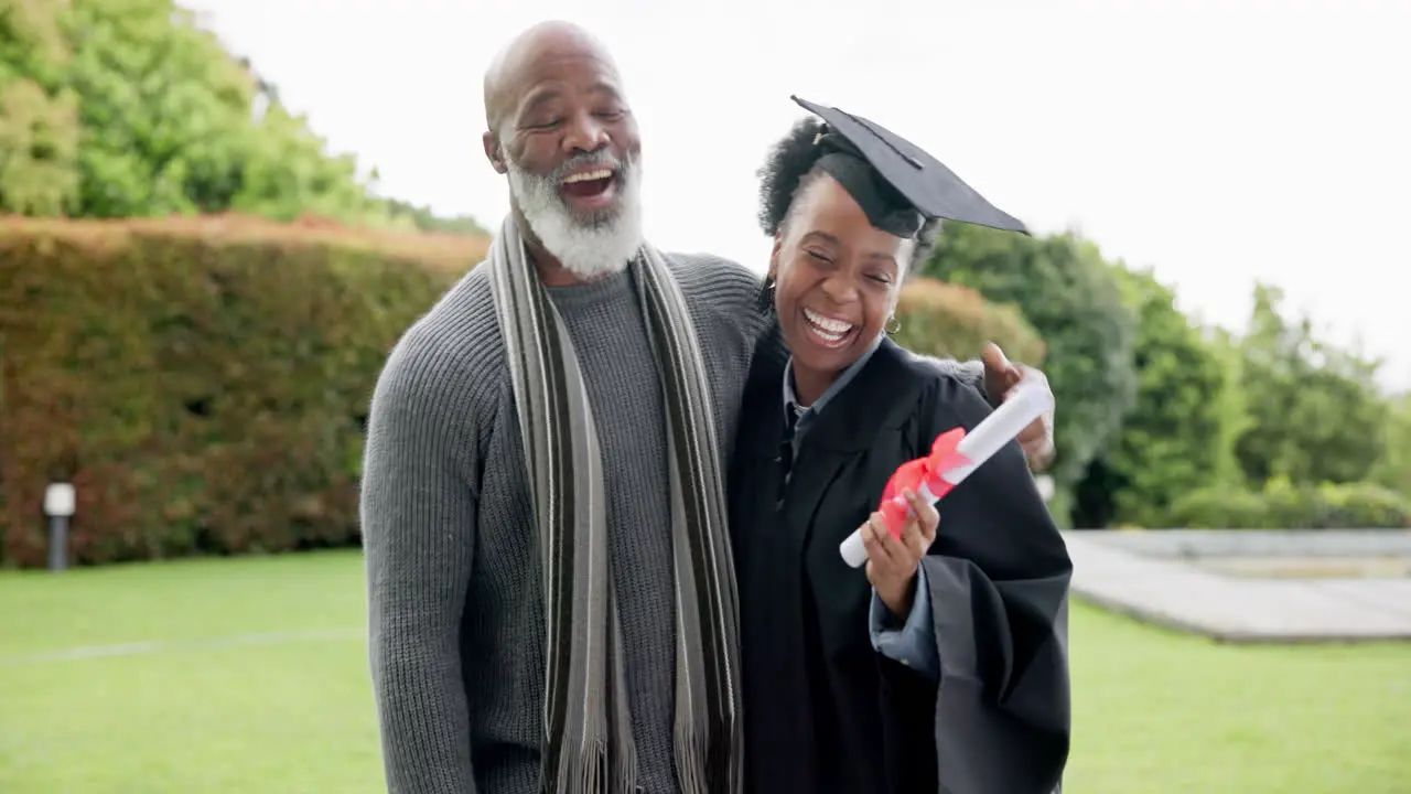 Black woman graduation and hug happy father