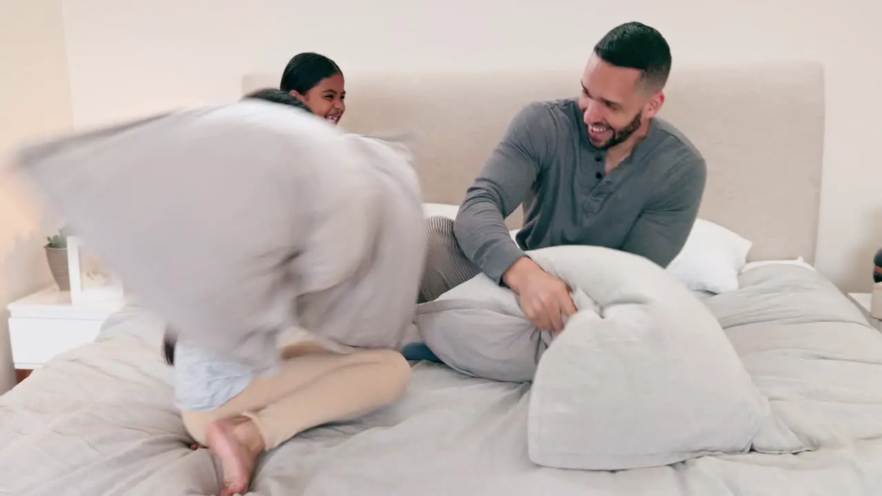 Father bed or pillow fight with children for love