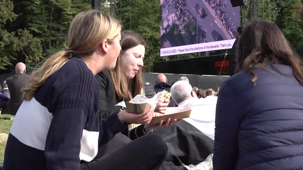 Friends gather to mourn the passing of the Queen in Hyde Park central London UK