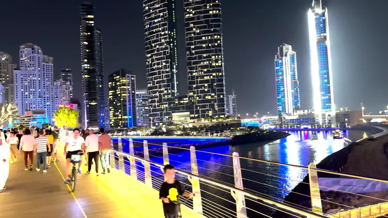 A bustling night on Bluewaters Island Dubai with people enjoying the vibrant atmosphere of the new walking area shopping mall and restaurants