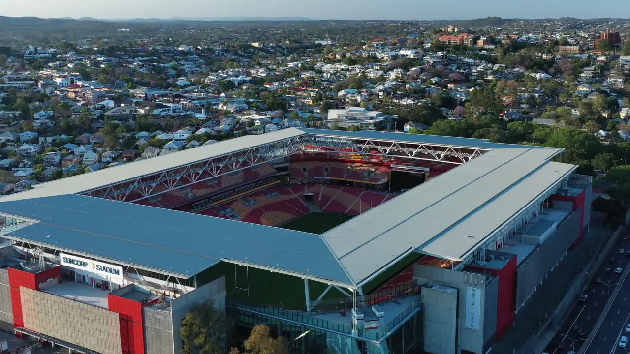 Aerial drone shot tracking away from Brisbane's Suncorp Stadium with stunning aerial views of inside the stadium