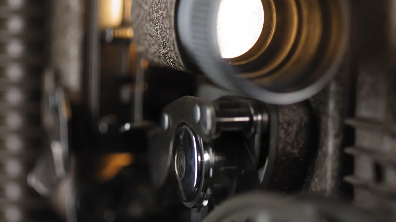 Macro Shot of film being played in vintage 8mm Projector