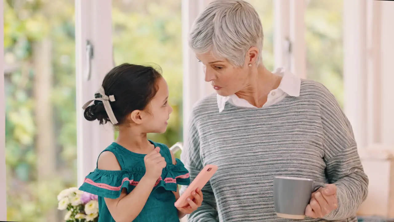 Family phone and girl with grandmother