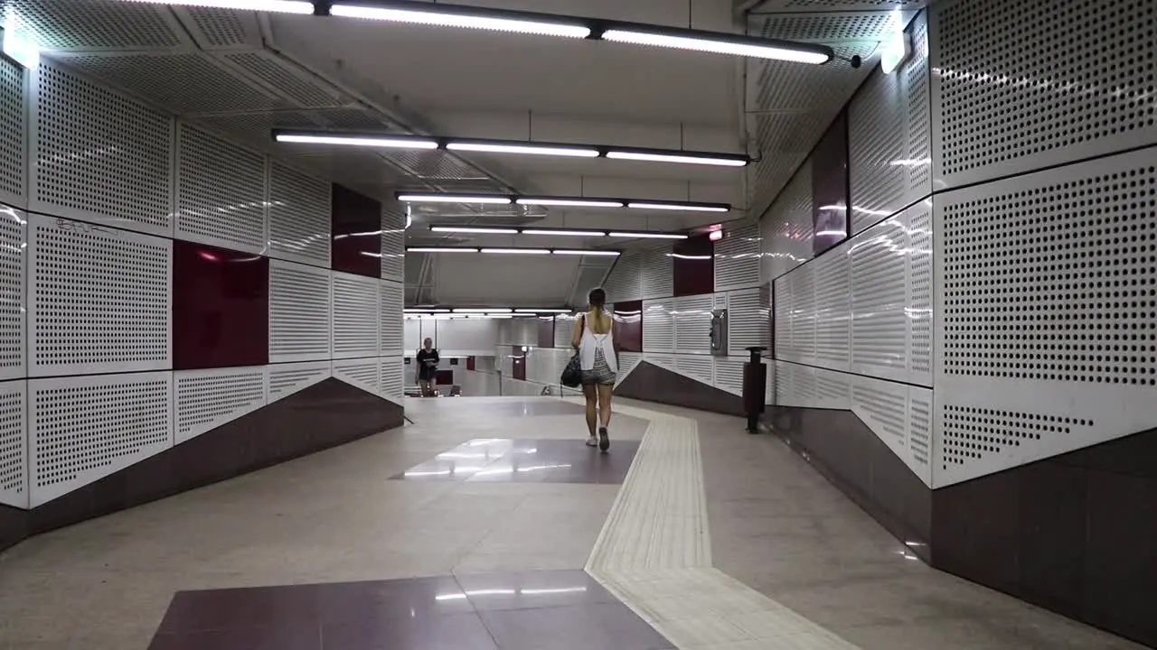 Girl Walks Into The Metro Station In Bucharest