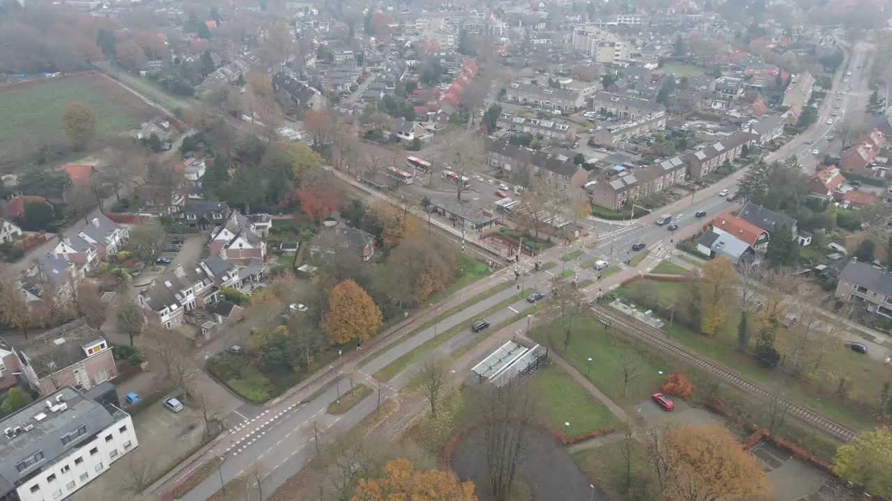 Jib down of busy road at the edge of small city in the Netherlands