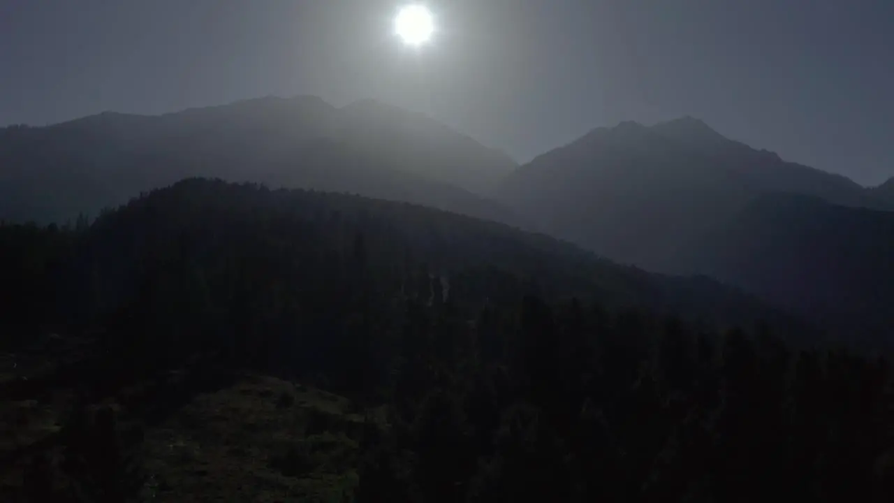 aerial drone view The sun is shining and the mountains are visible