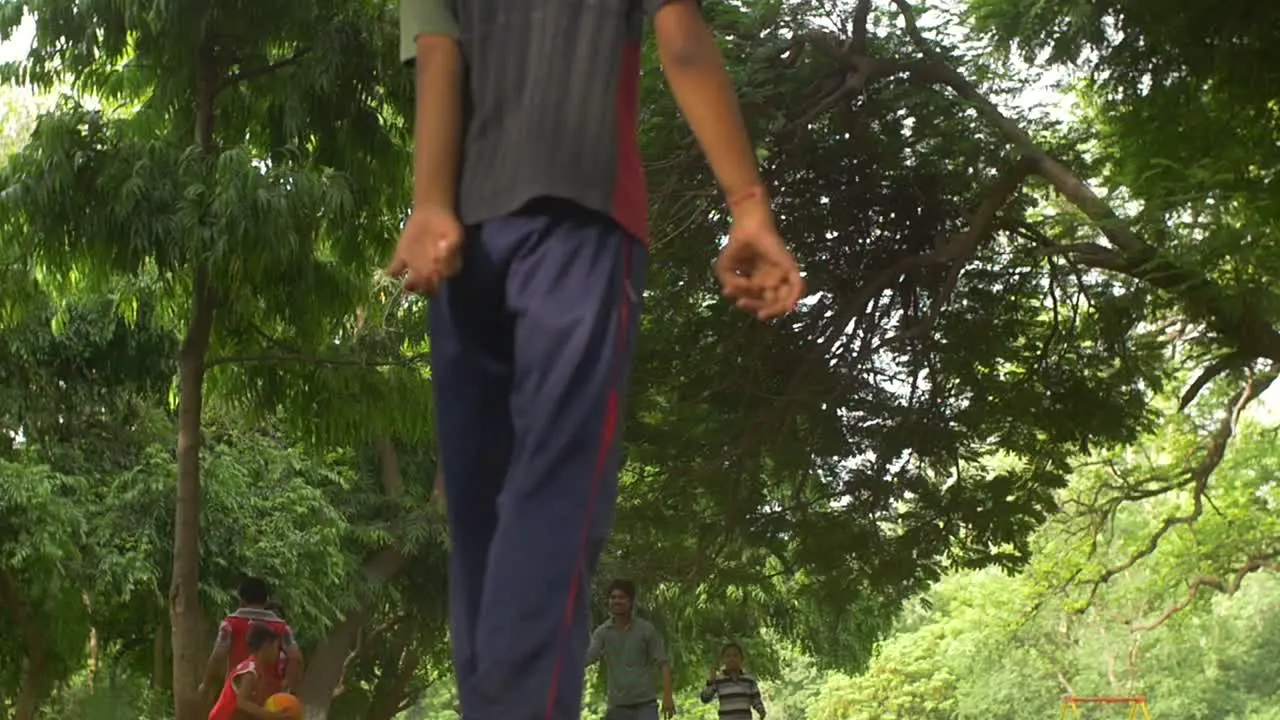 Indian Boys Playing Football in a Park