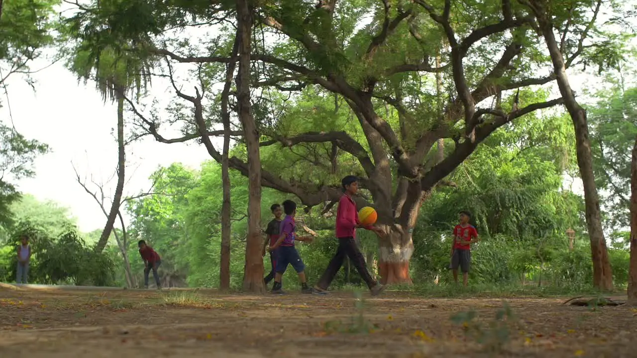 Low-Level Shot of a Football Game in a Park