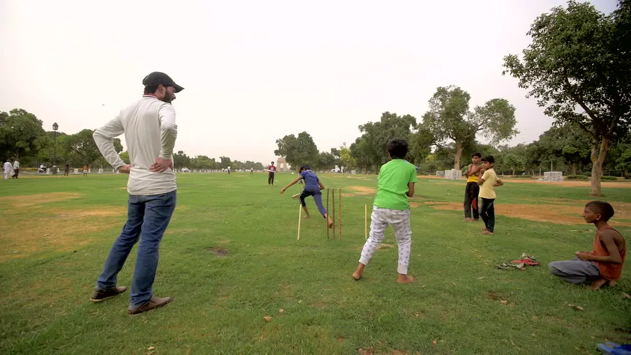 Young Indian Wicket Keeper Catches a Ball