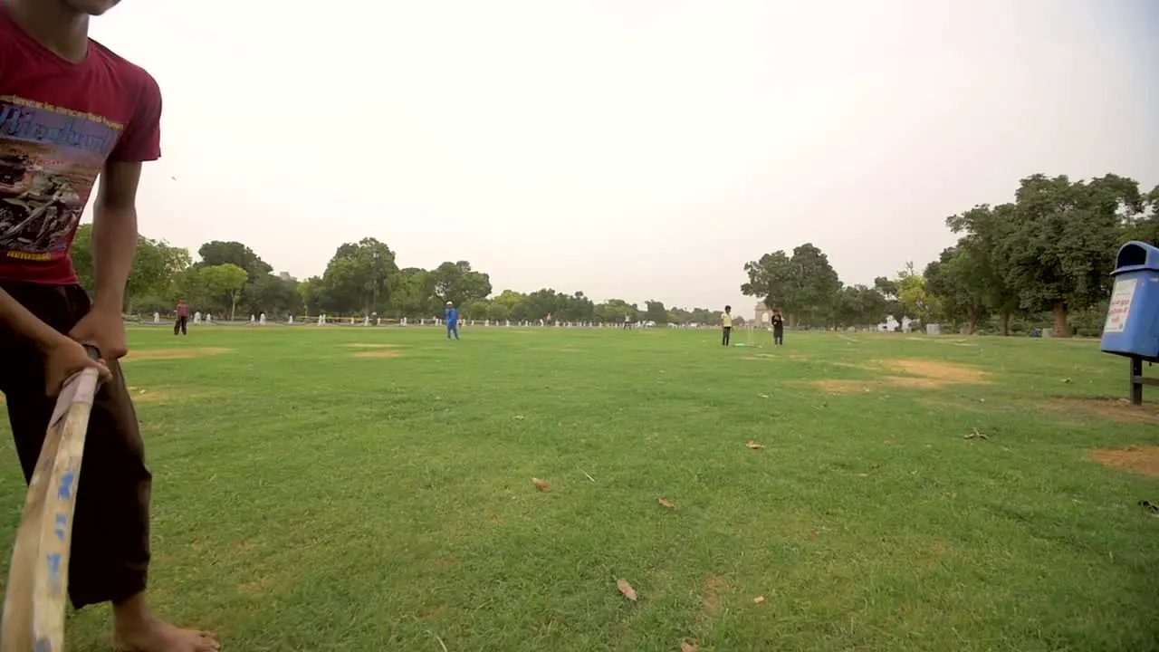 Indian Children Play a Game of Cricket