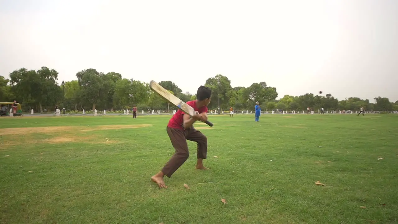 Indian Children Playing Cricket