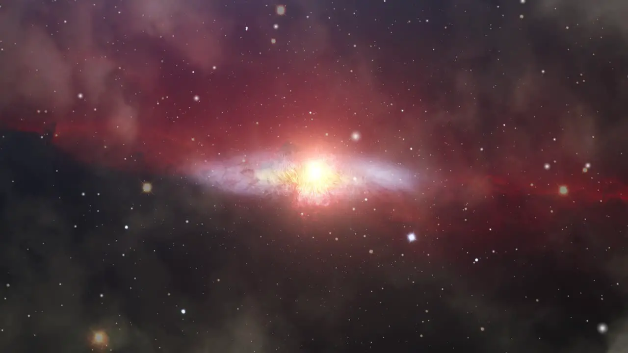 a galaxy and red nebula clouds in the universe