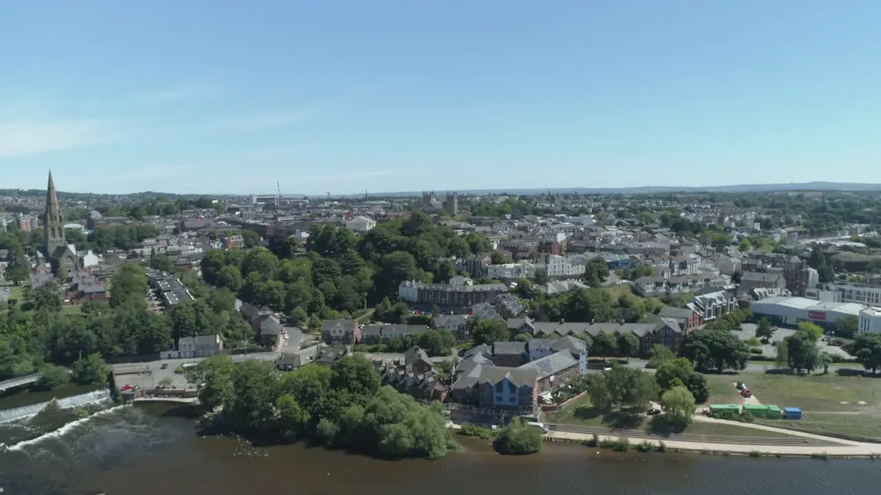 Rising aerial from the south side of the river exe facing the city centre