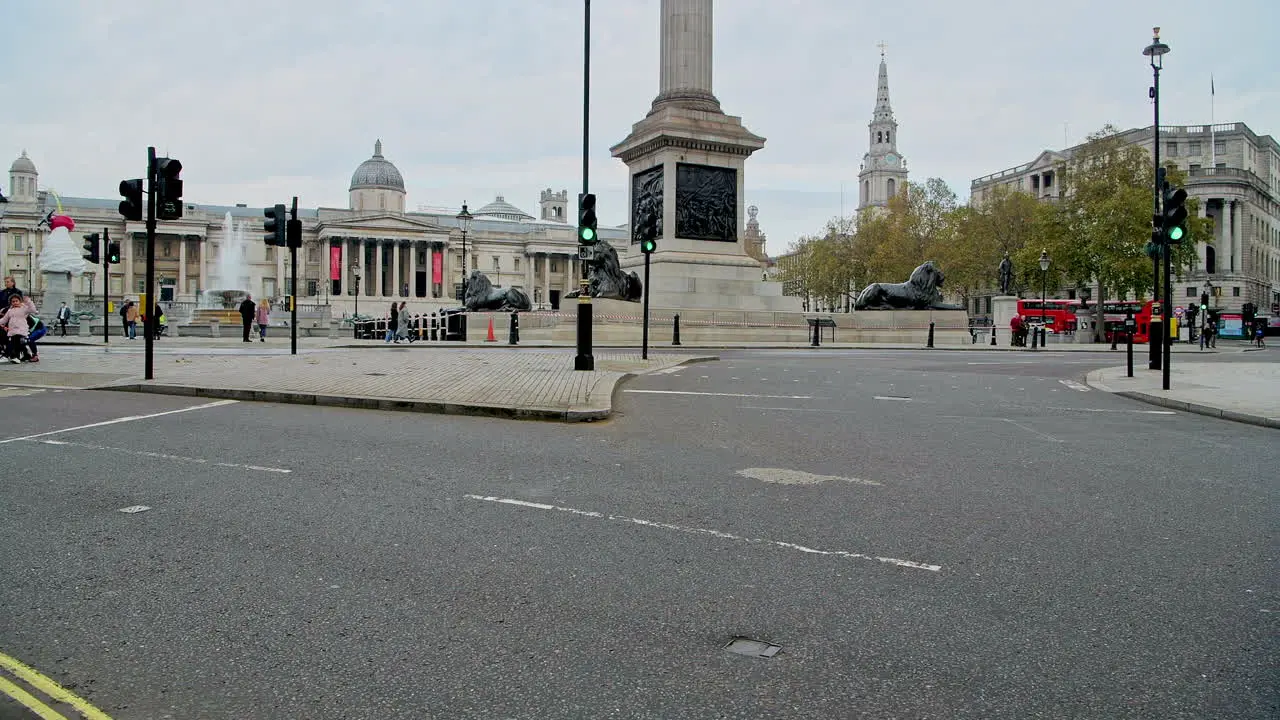 Quiet empty streets in London with no cars or traffic during Coronavirus Covid-19 pandemic lockdown at Trafalgar Square and Nelsons Column in London in the City of Westminster England UK