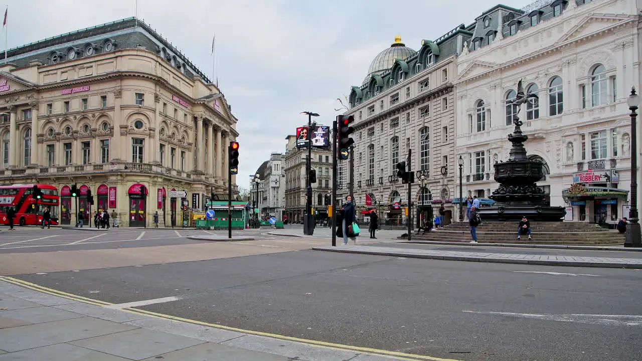 Empty tourist attraction and roads in London in Covid-19 Coronavirus lockdown at Piccadilly Circus with quiet streets in the West End during the pandemic in England Europe