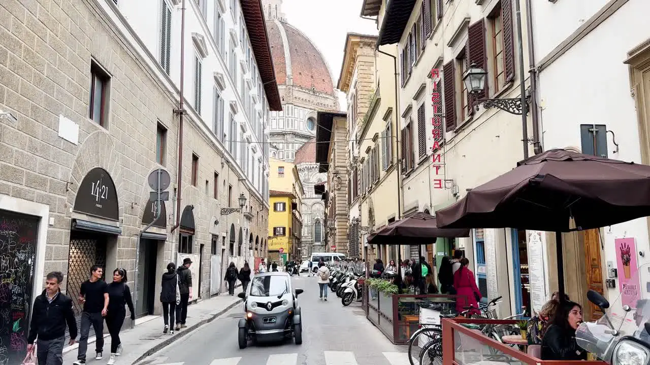 Via dei Servi with the dome of Santa Maria del Fiore in the background Florence