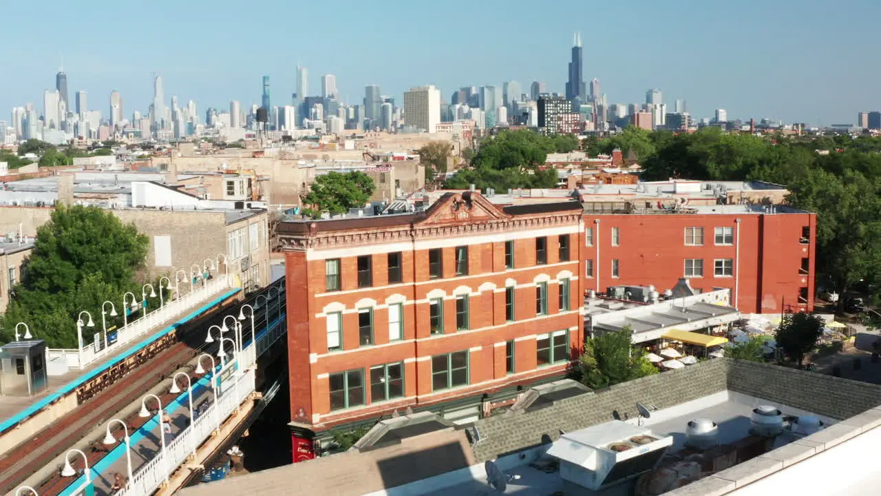 Person is walking along a railway in a typical American city Aerial View