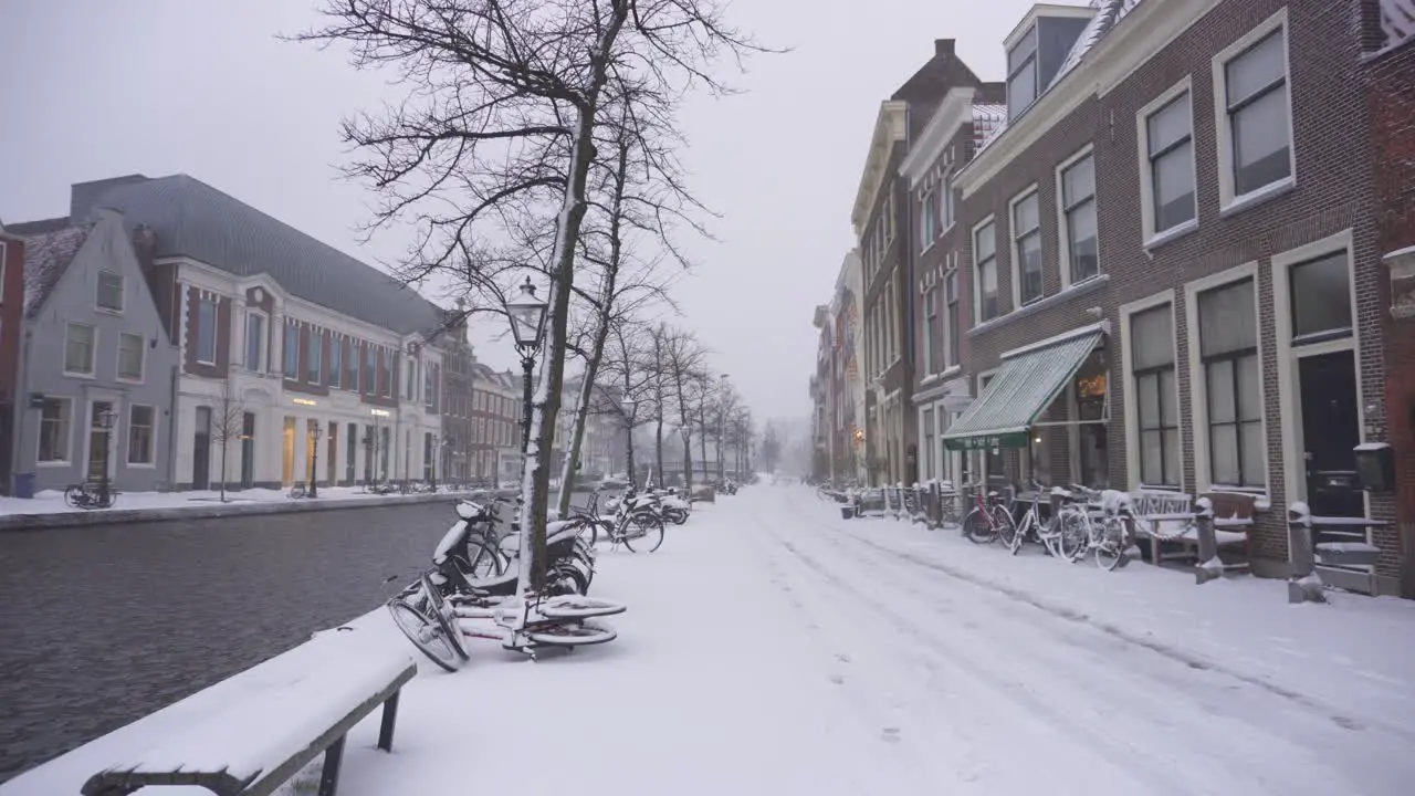 Leiden city streets in winter snow Rijn Rhine riverside Netherlands