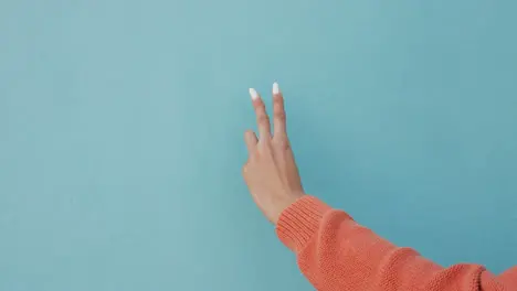 Hand of woman countdown with math finger