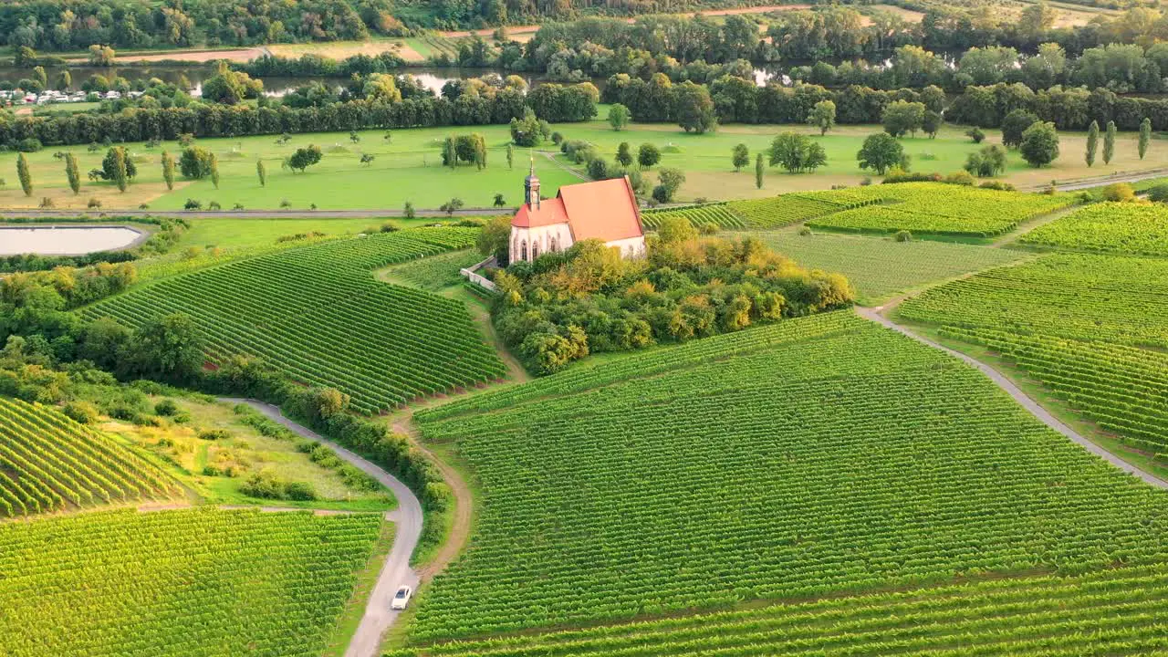 Drone flight around the small church "Maria im Weingarten" near Volkach on the river Main in Germany